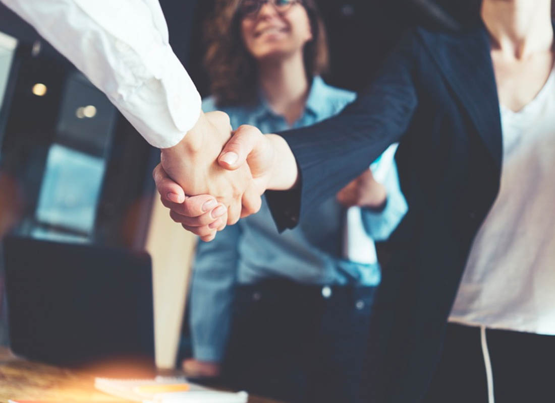 Insurance Agents & Brokers - Strong Handshake with Colleagues