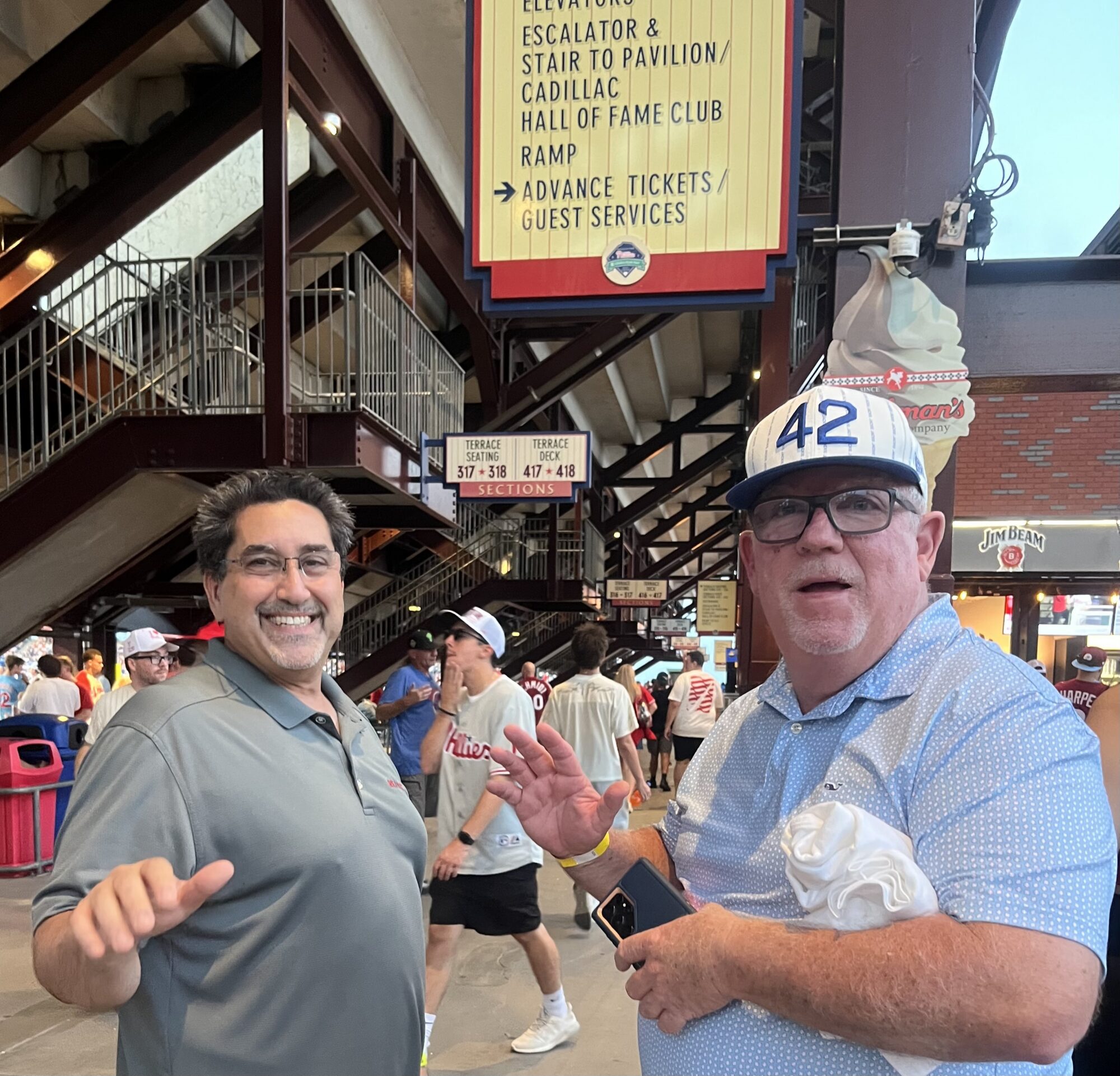 Insurance Agent Charlie Longen and Renzo Naimo from RE/MAX in Exton and Downigtown enjoy a night at the Phillies